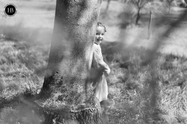 little-girl-plays-hide-and-seek