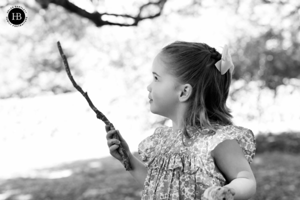 little-girl-with-stick-as-magic-wand