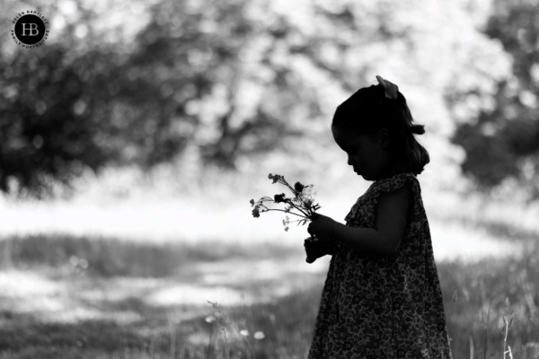 silhouette-little-girl-with-flowers