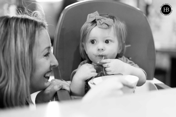 toddler-eating-spaghetti-in-high-chair