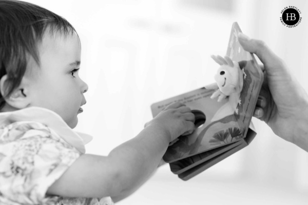 baby-reads-book-with-finger-puppet