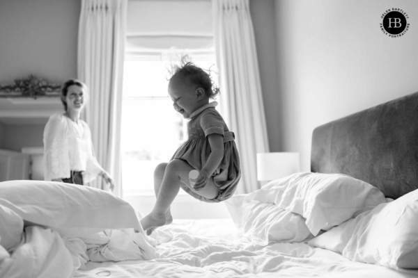 child-jumps-on-bed
