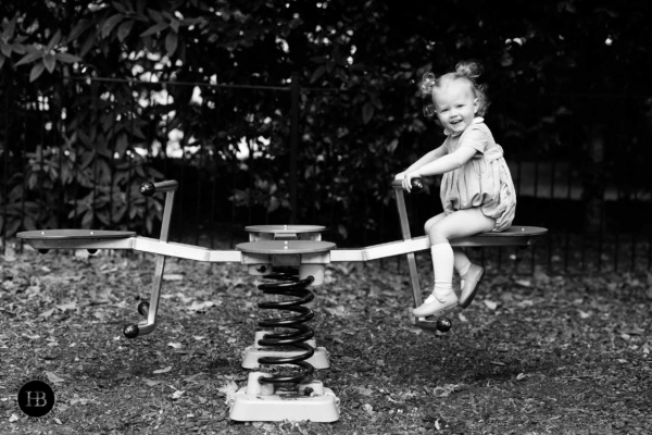 little-girl-plays-on-see-saw