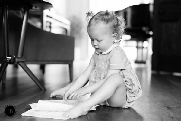 little-girl-reads-magazine-documentary-style-family-photography-london