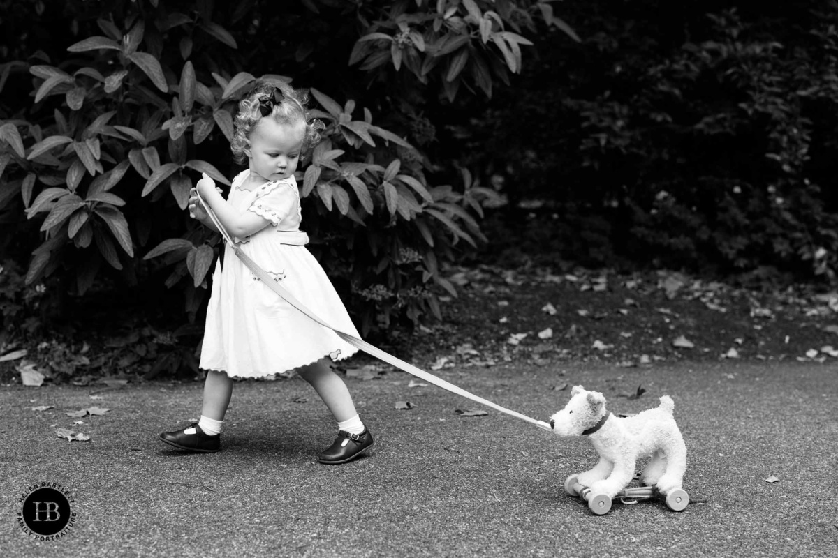 little-girl-walks-toy-dog-belgrave-square