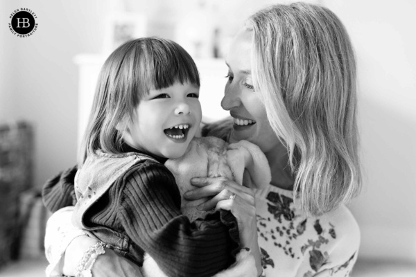 mother-and-daughter-laughing-together-family-photographer-wimbledon-sw19