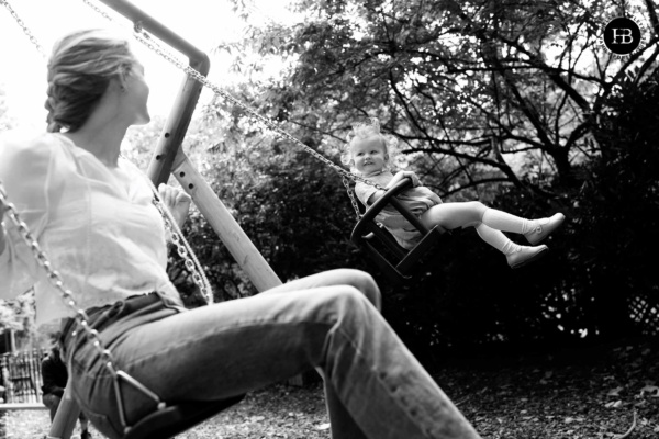 mother-and-daughter-play-together-on-swings