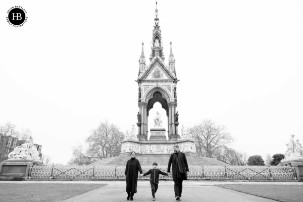Family walking together in front of the Albert Memorial in Kensington Gardens