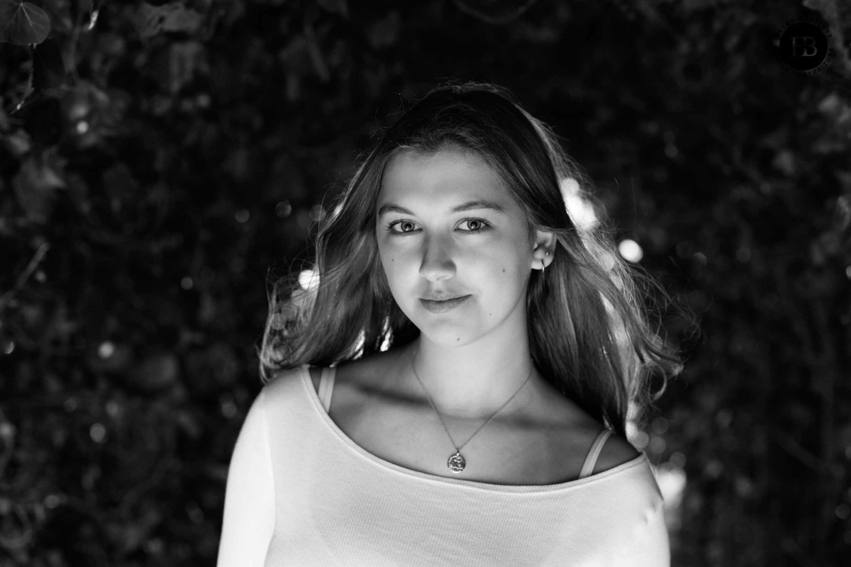 Monochrome portrait of teenage girl taken at Hampstead Heath Pergola