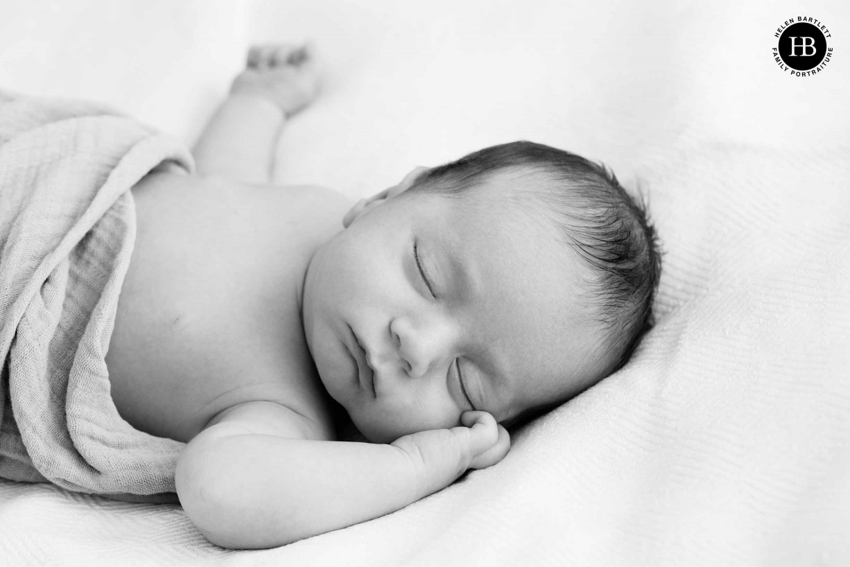 sleeping newborn boy on professional photo shoot north london