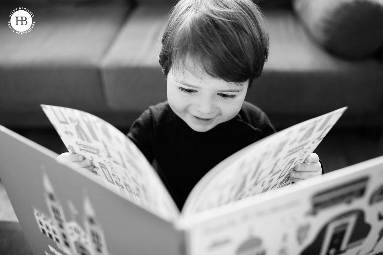 toddler reads big book