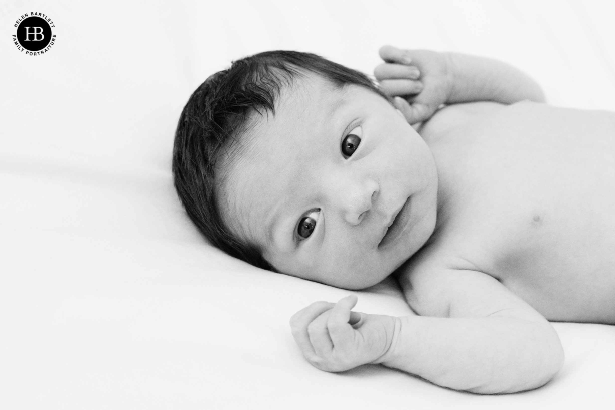 wide awake newborn baby at home newborn portraits in Hampstead