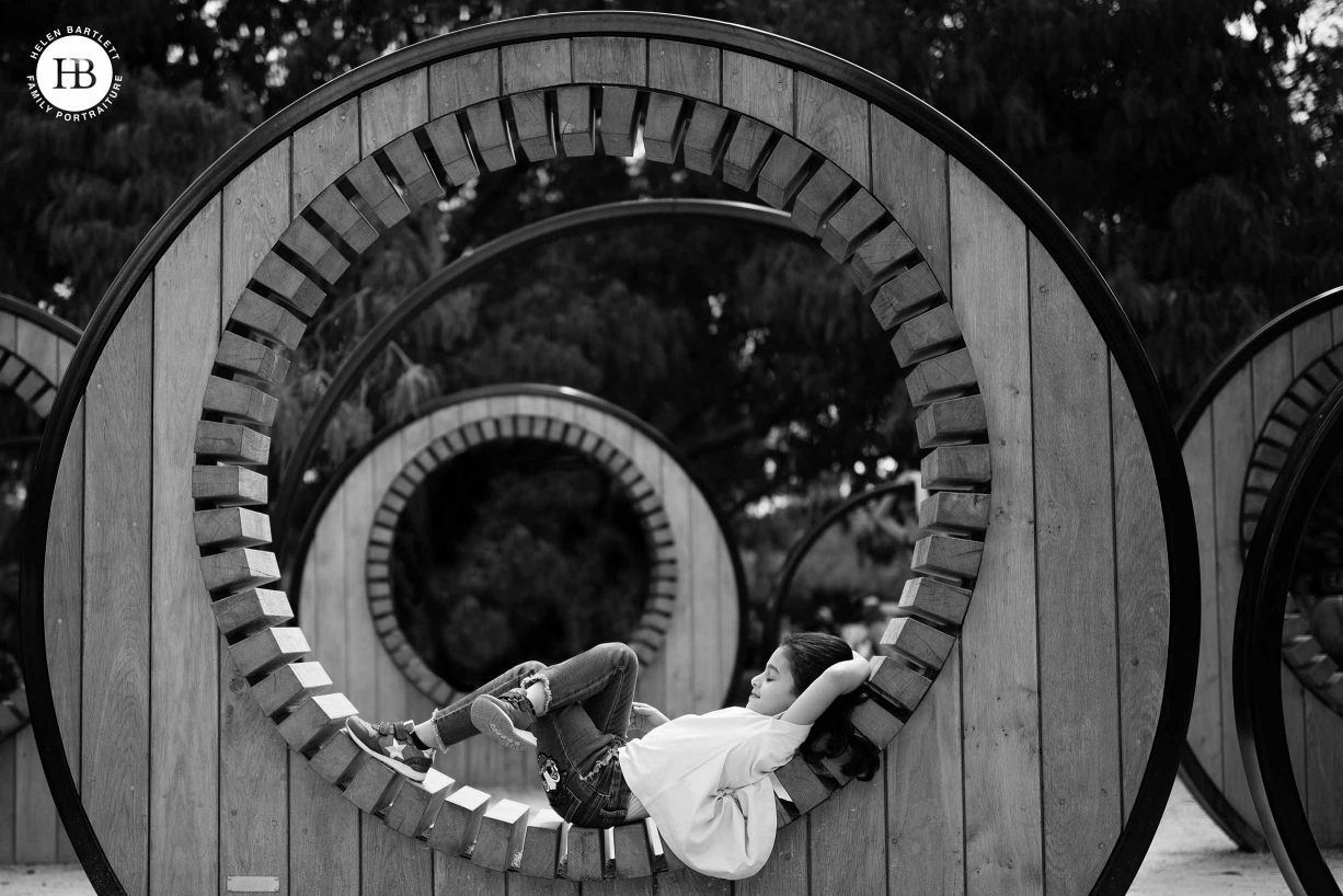 girl-sleeps-wooden-sculpture