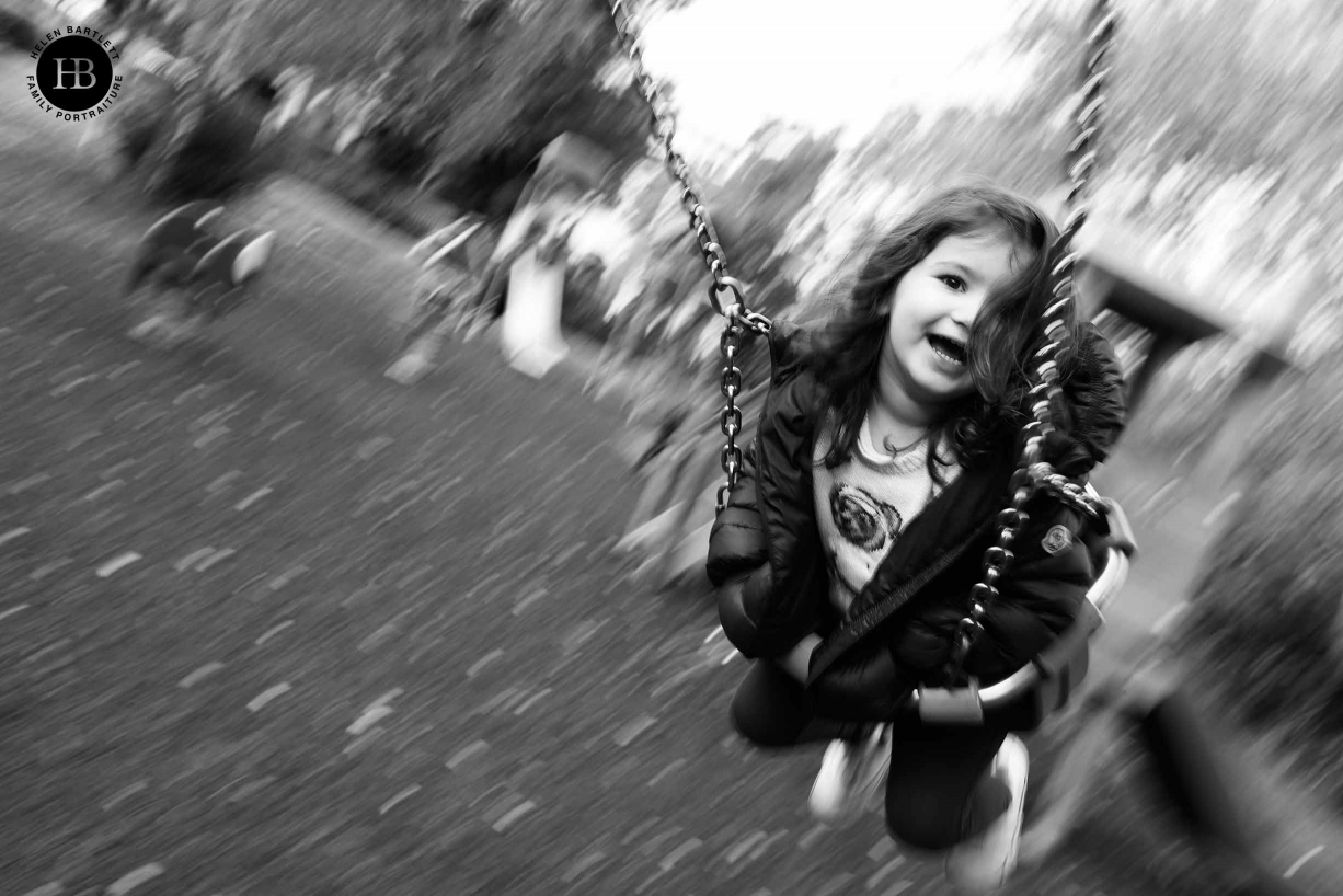 panning shot of girl on swing with canon 1DX mark III