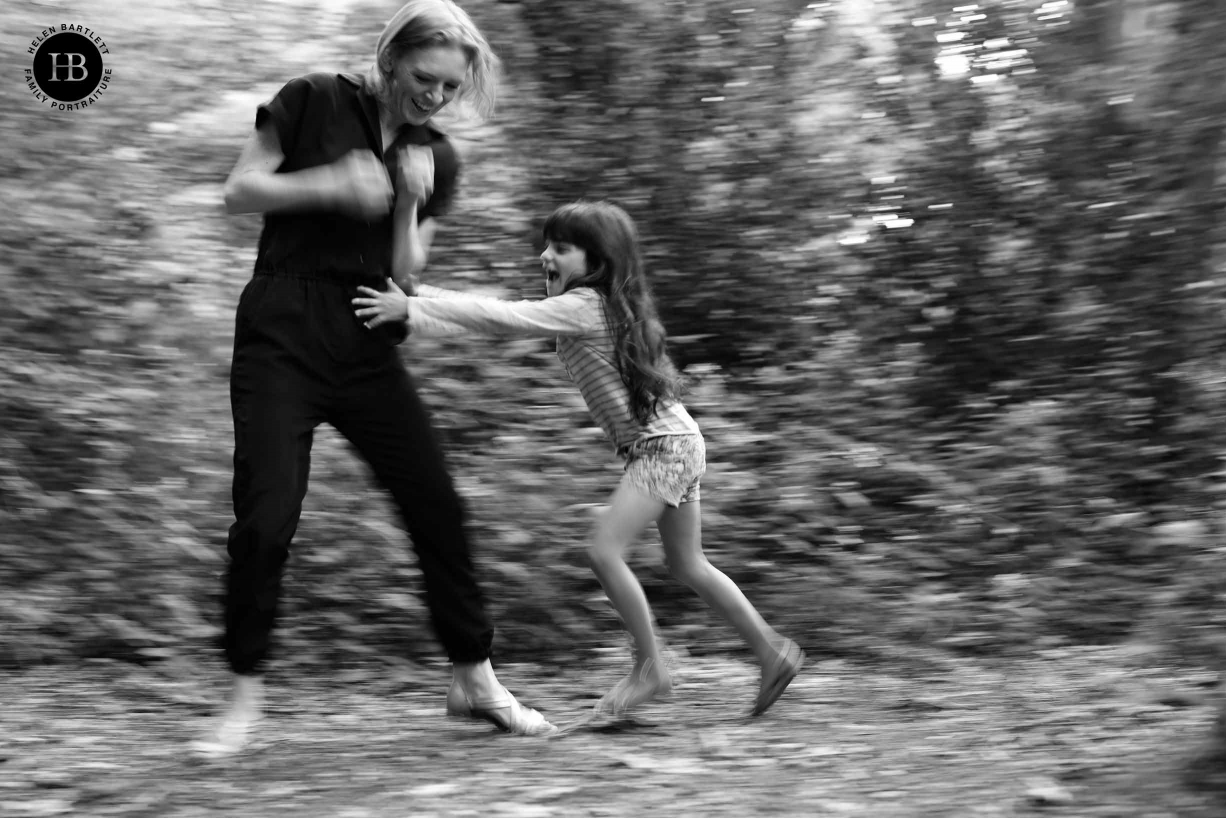 Little girl chases mother shot with 1/30 slow shutter speed panning. This image with the one above show how the new in body image stabilisation will give new creative possibilities.