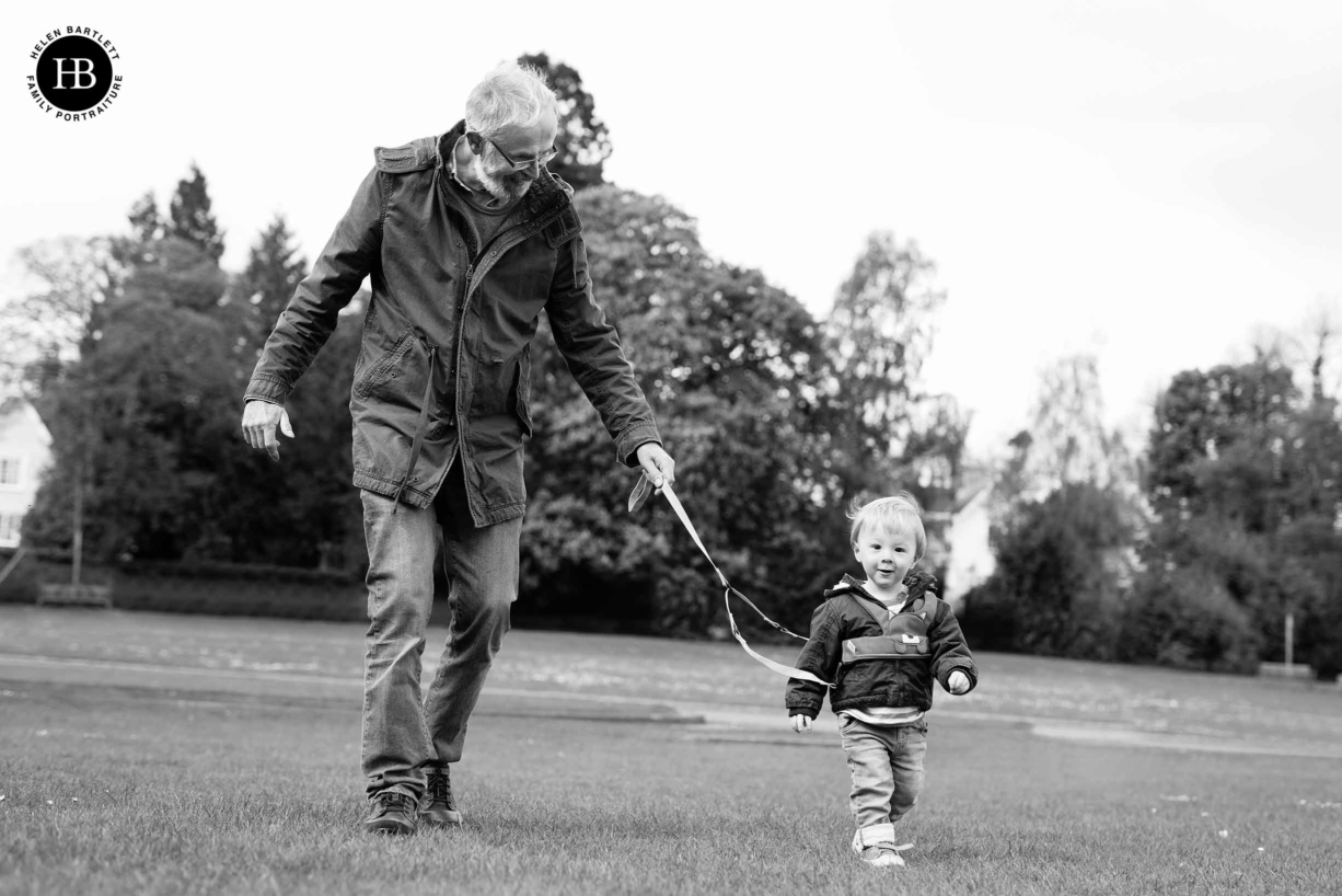 grandfather-plays-park-with-grandson