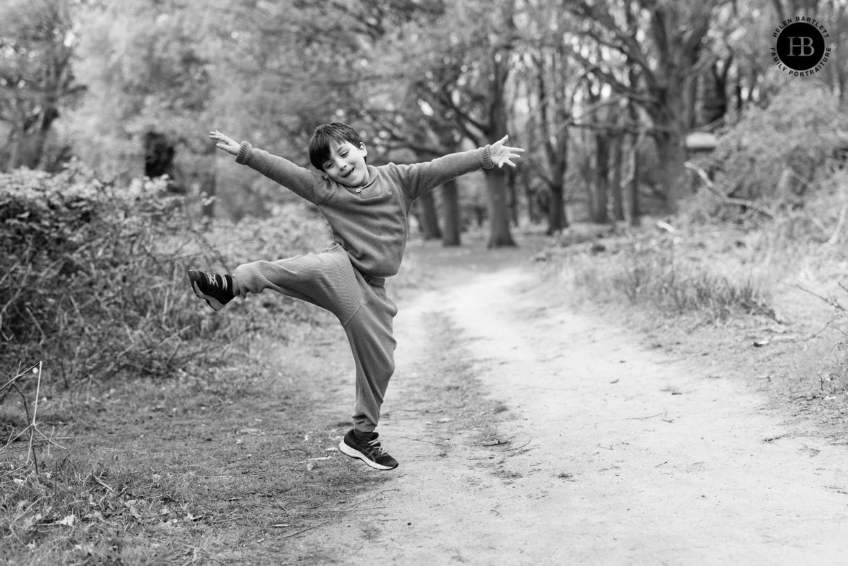 boy-jumps-in-air-during-a-game-in-richmond-park