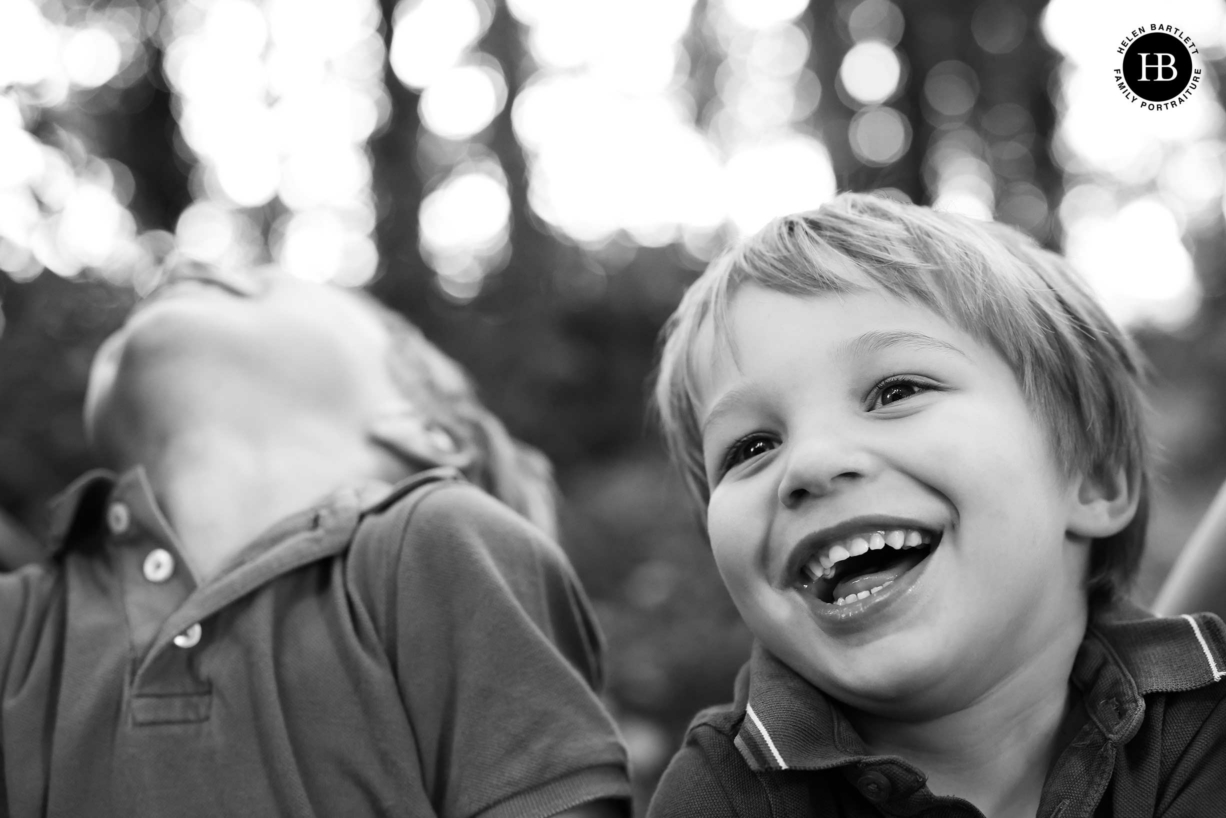 children-laughing-portrait-canon-camera