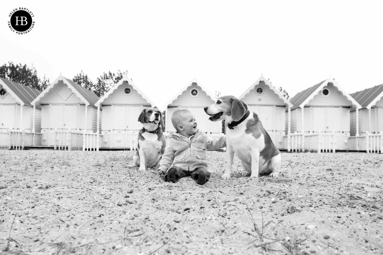 6-month-old-baby-sitting-with-dogs