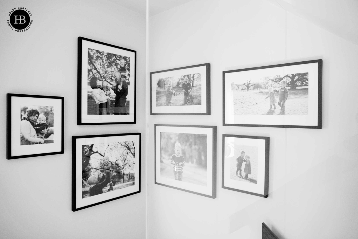 mixed shapes and sizes in gallery hang to display family photos