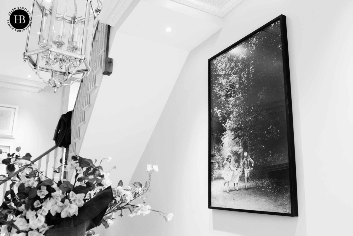 very large framed family portrait in London townhouse