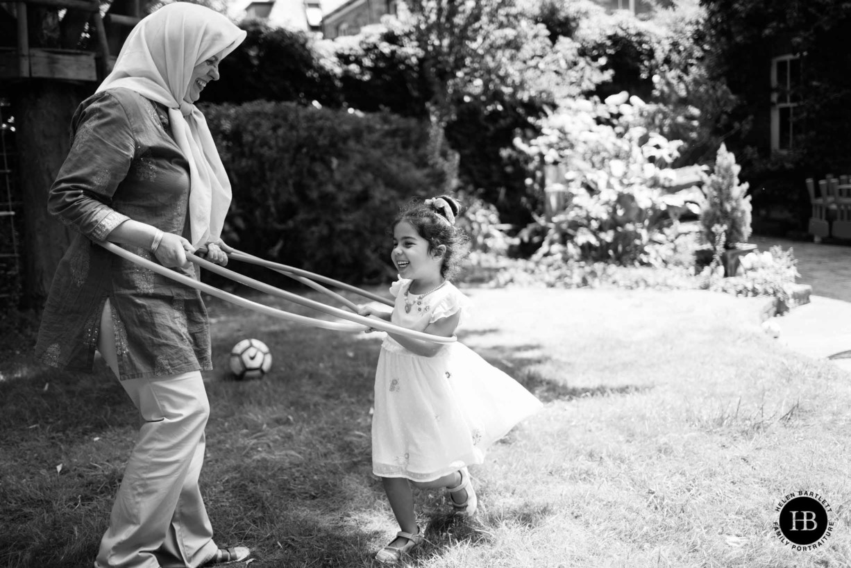 little-girl-plays-hoop-grandmother-family-photography-chiswick