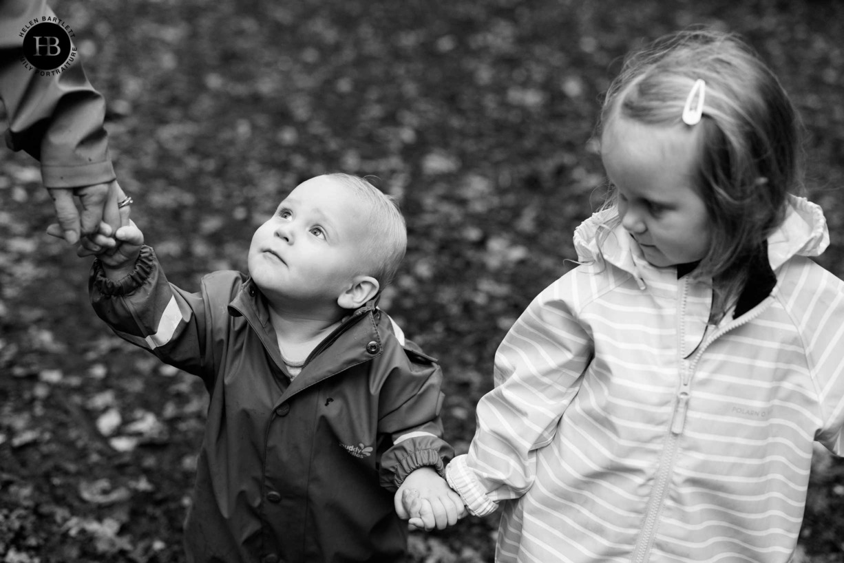 baby-looks-at-mother-woodland-portrait