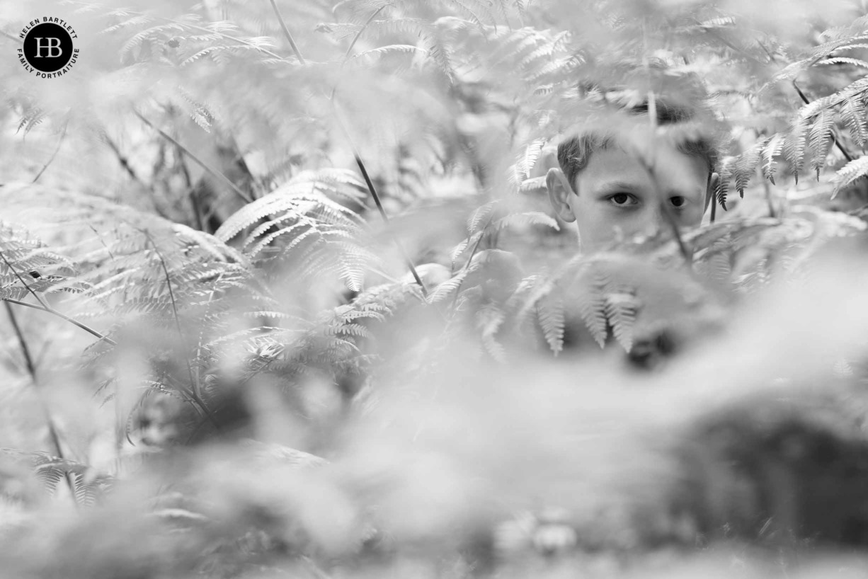 boy-hides-in-bracken-wimbledon-common-london