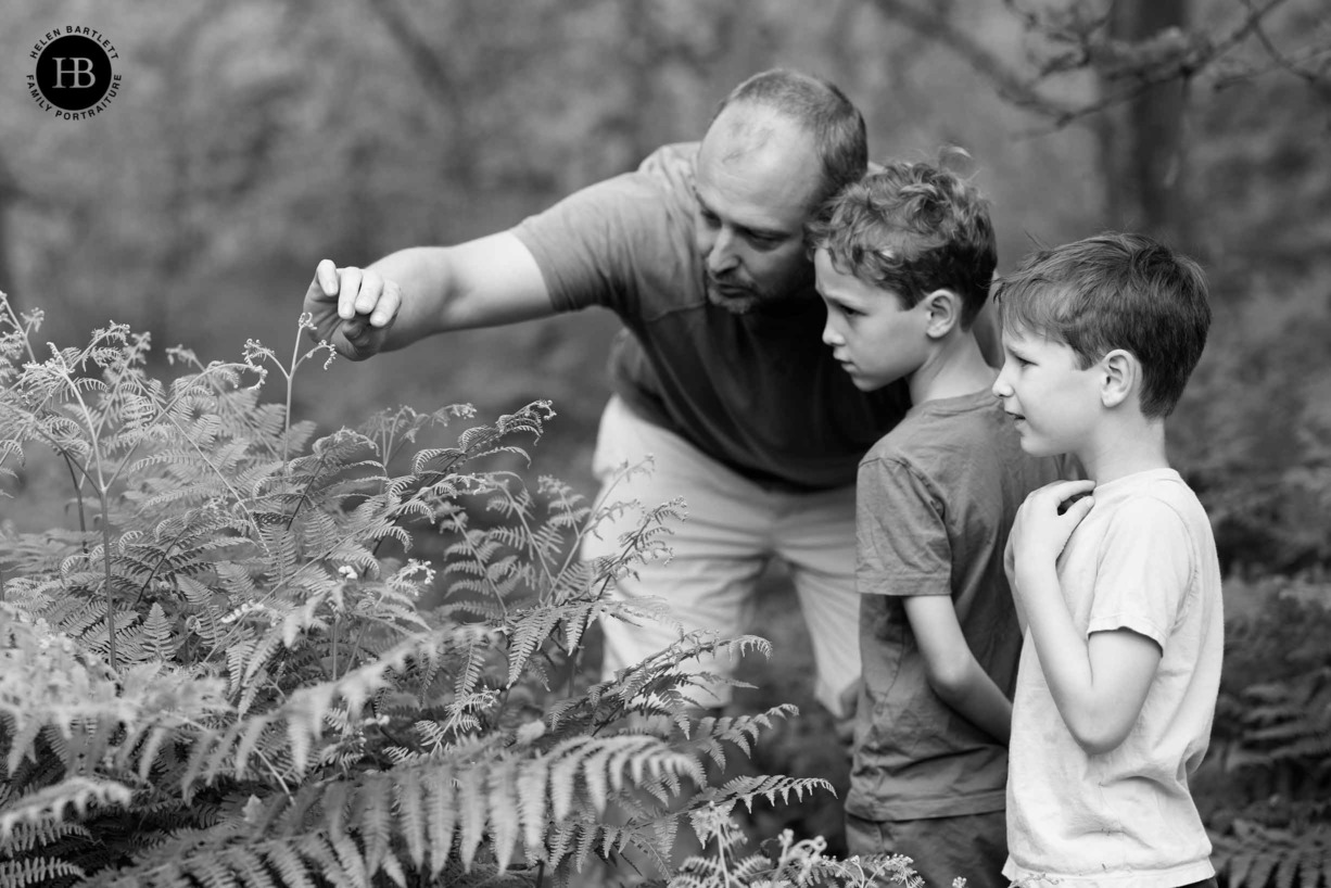 father-and-sons-looking-at-ferns-wimbledon