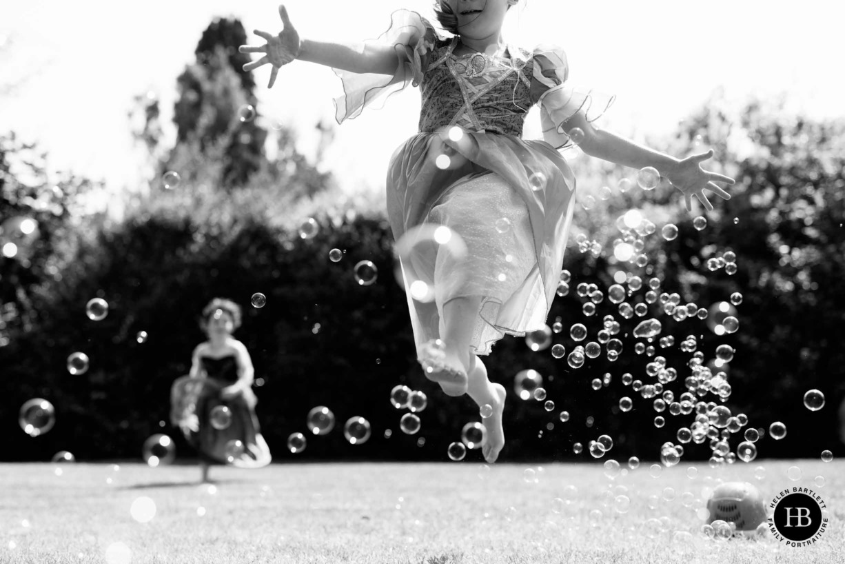 girl-leaps-out-of-picture-with-bubbles