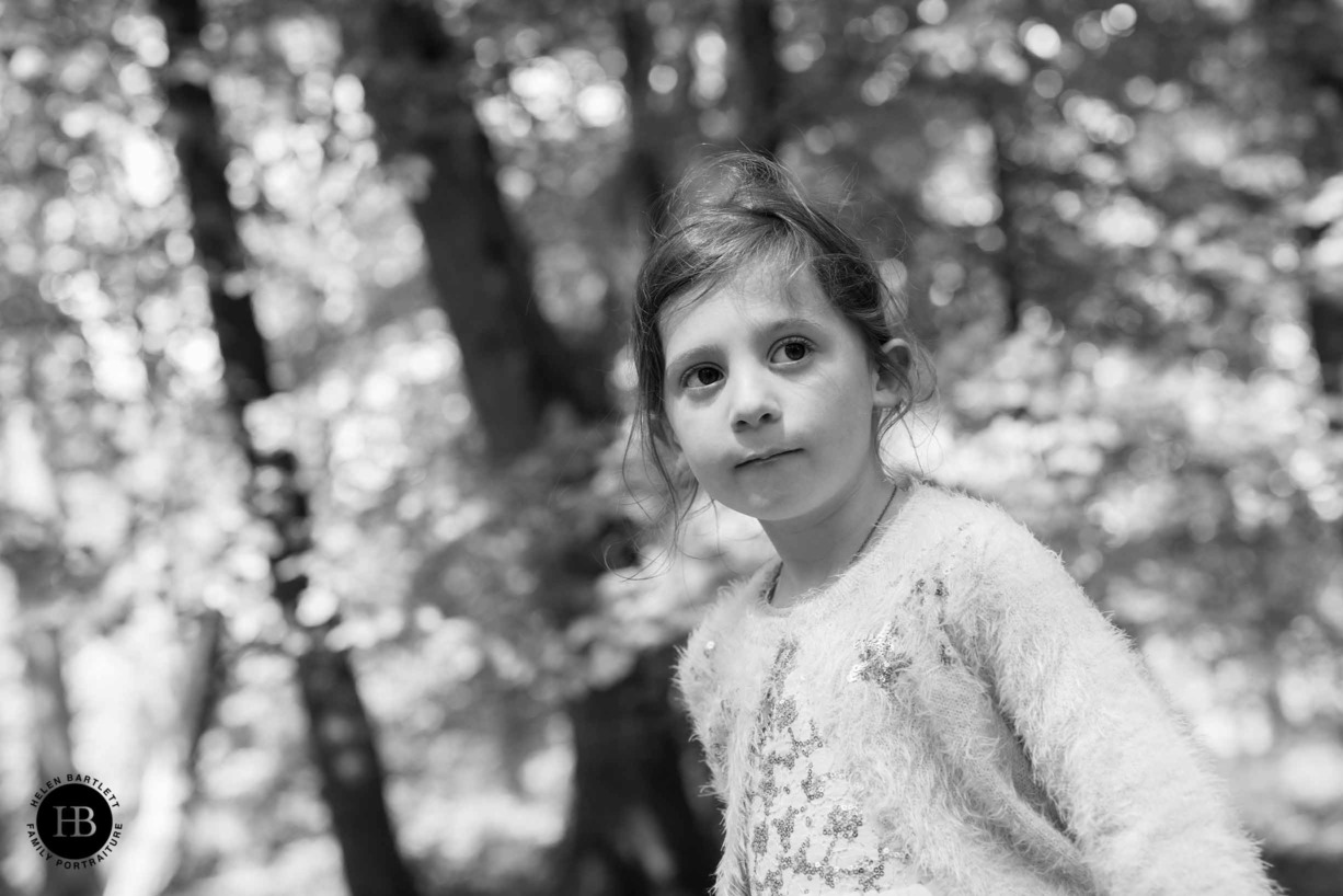 little-girl-in-beautiful-woodland-light