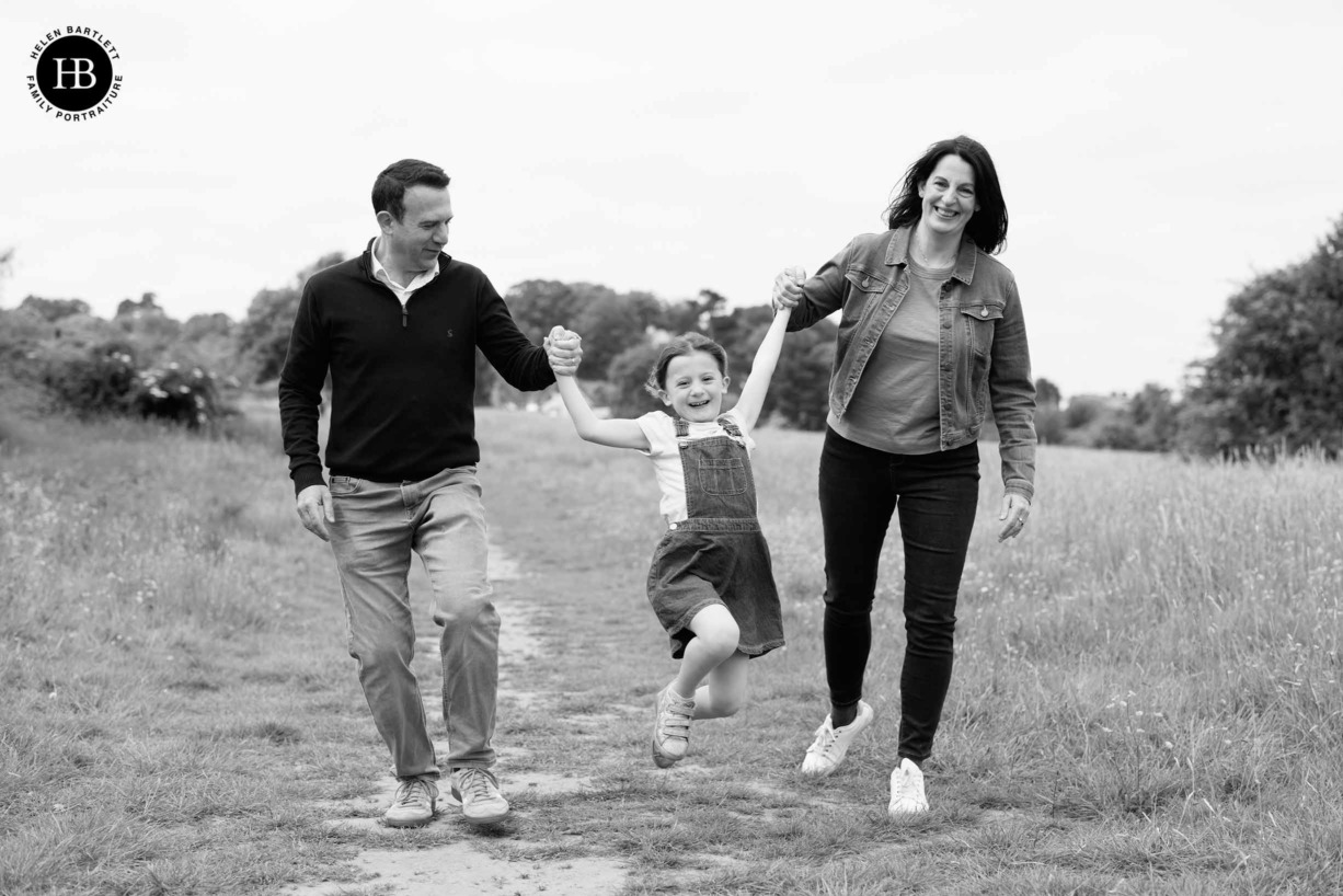 mum-and-dad-swing-daughter-oxted-photography-session