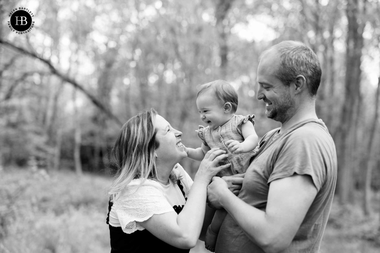 parents-play-with-baby-on-photo-shoot