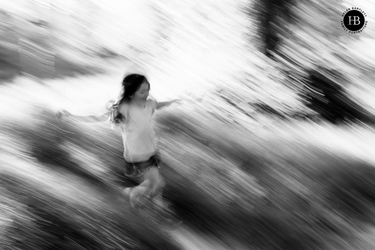 child-running-fast-on-hampstead-heath-fun-family-photo