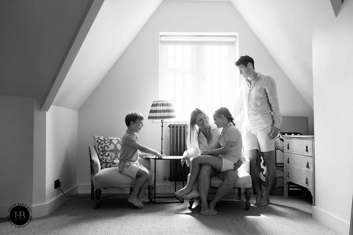 family-laugh-by-window