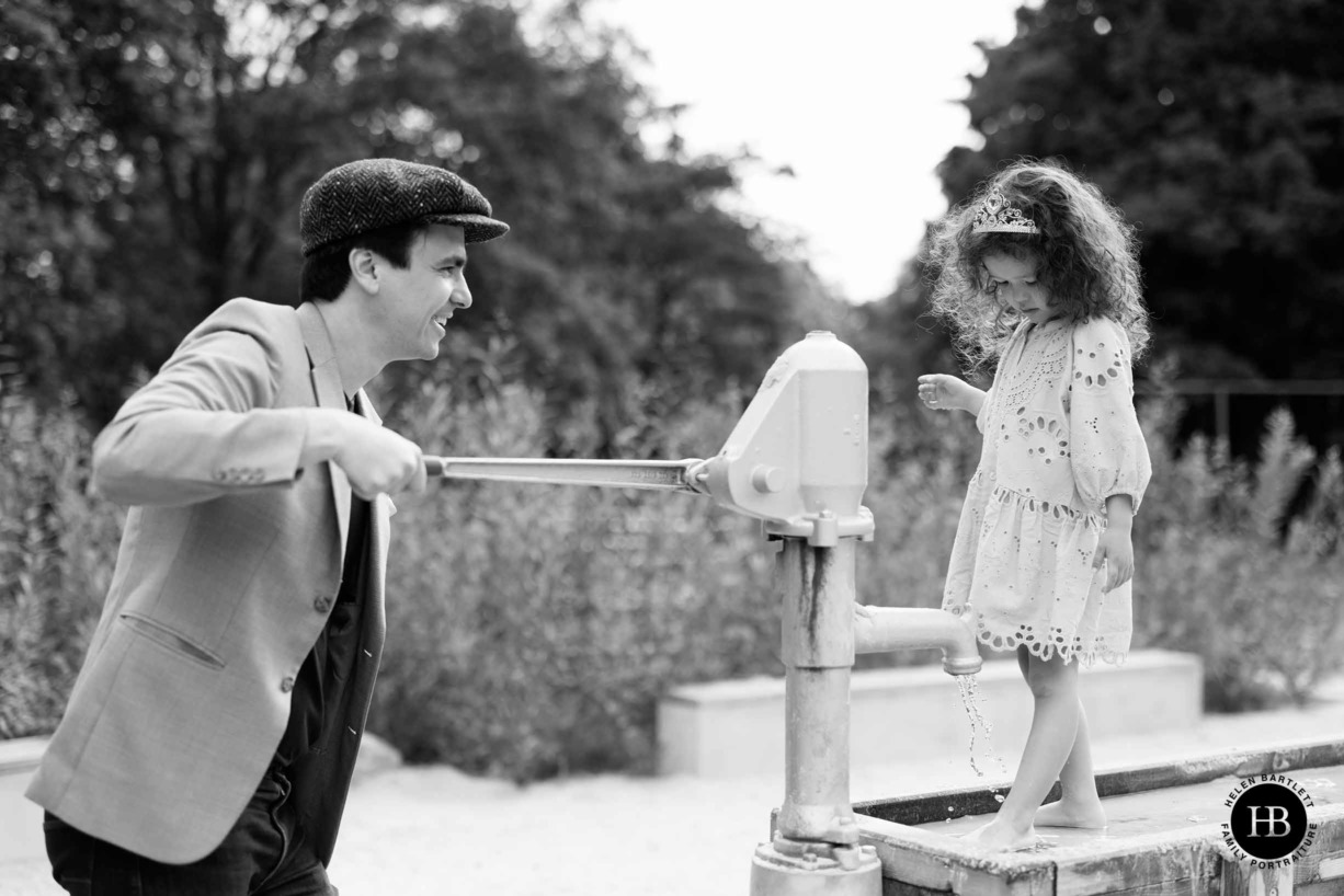 father-and-daughter-play-during-photo-shoot-primrose-hill