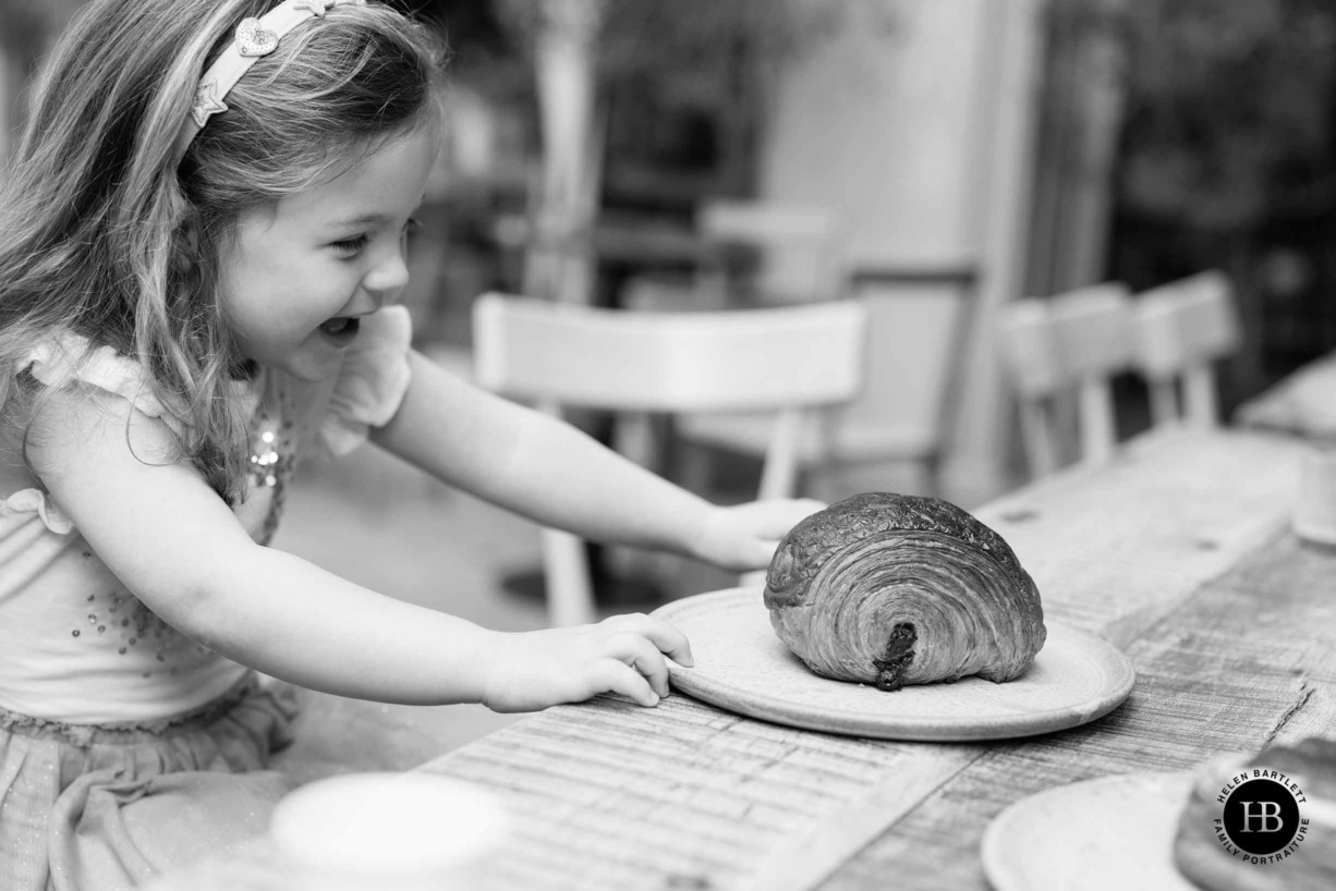 little-girl-delighted-croissant-pophams-bakery-hackney