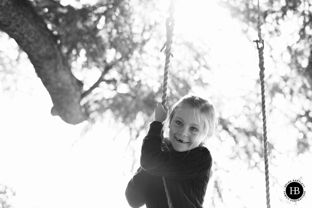 sun-filled-portrait-girl-on-rope-swing