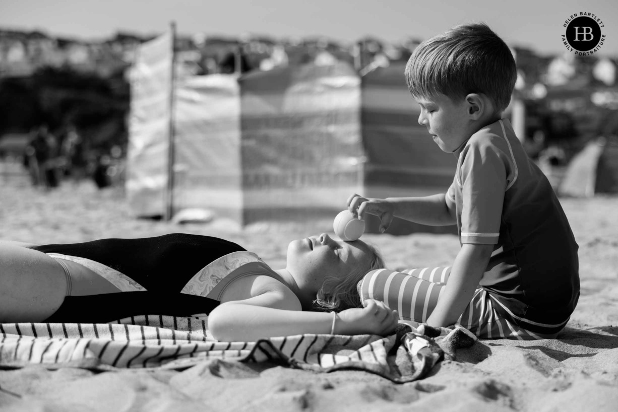 children-play-on-the-beach-polzeath