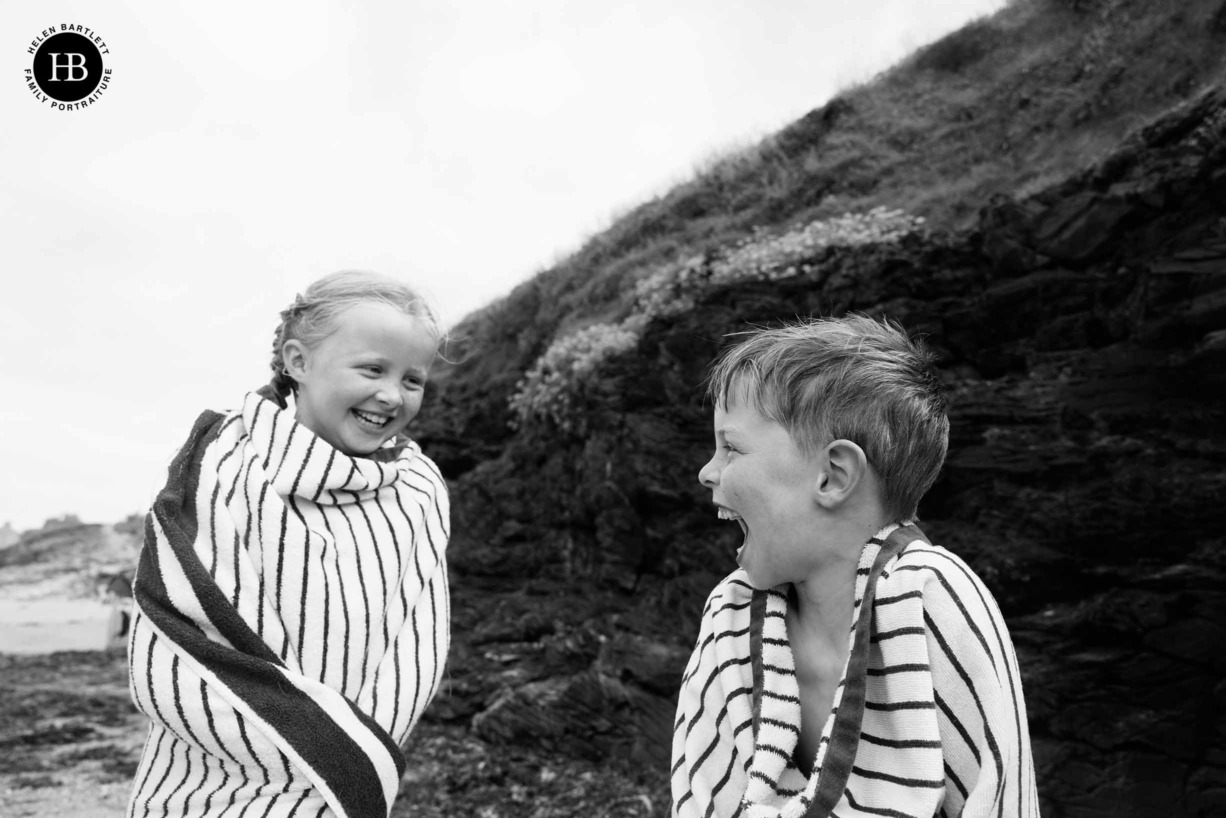 children-play-polzeath-beach-cornwall