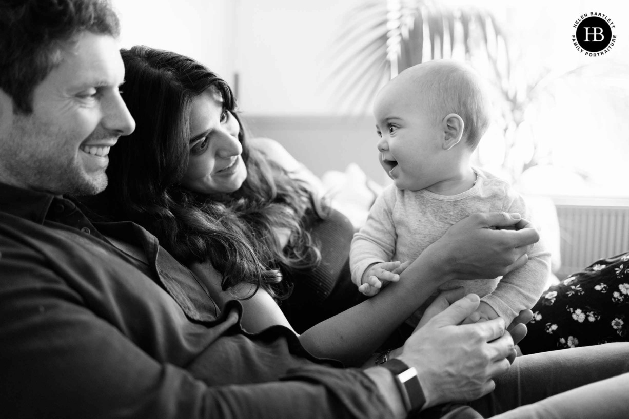 joyful-family-portrait-on-sofa