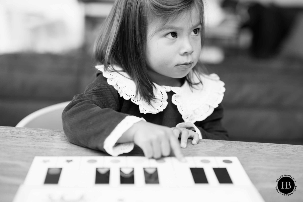 little-girl-plays-with-toy-piano