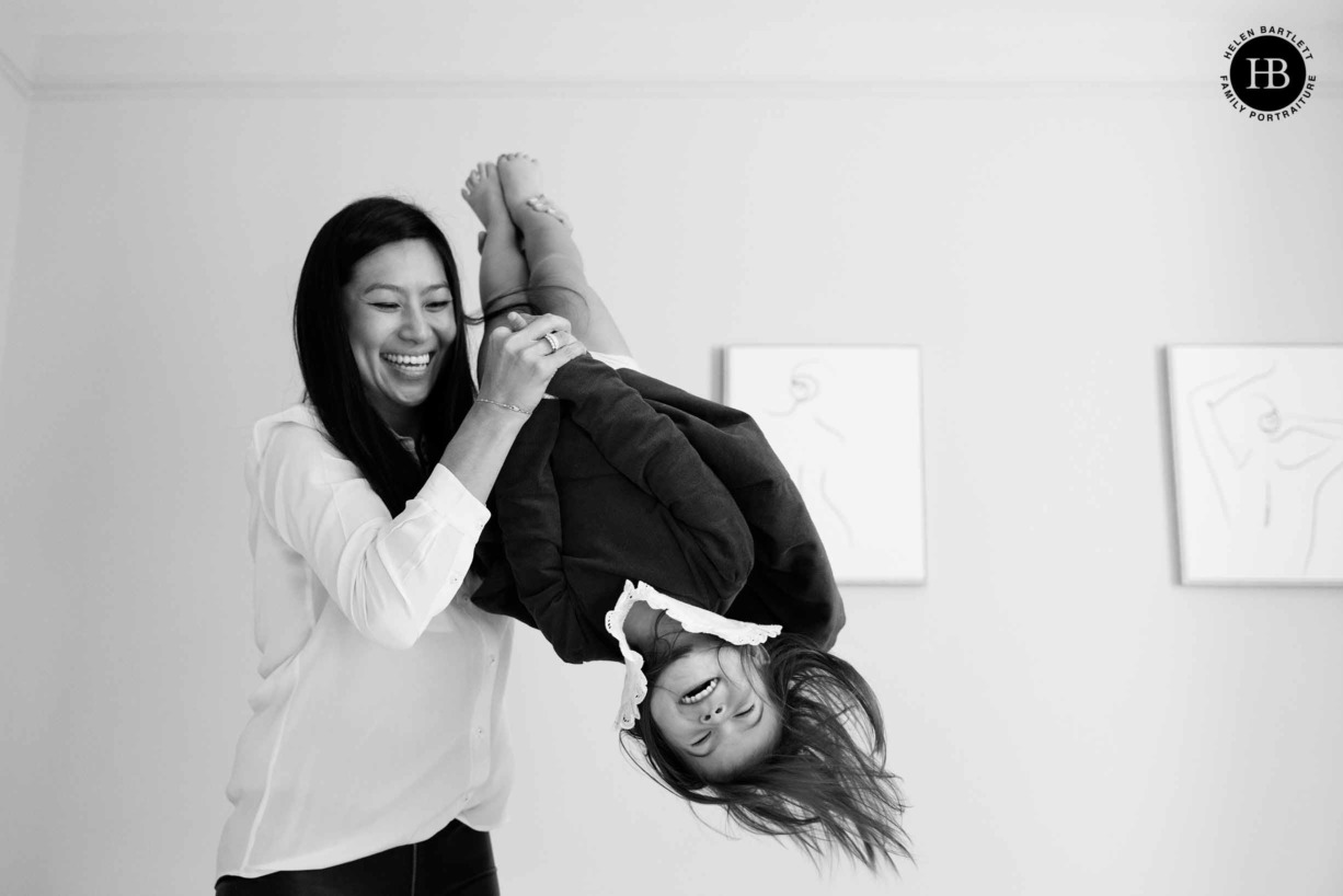 mother-swings-daughter-in-air