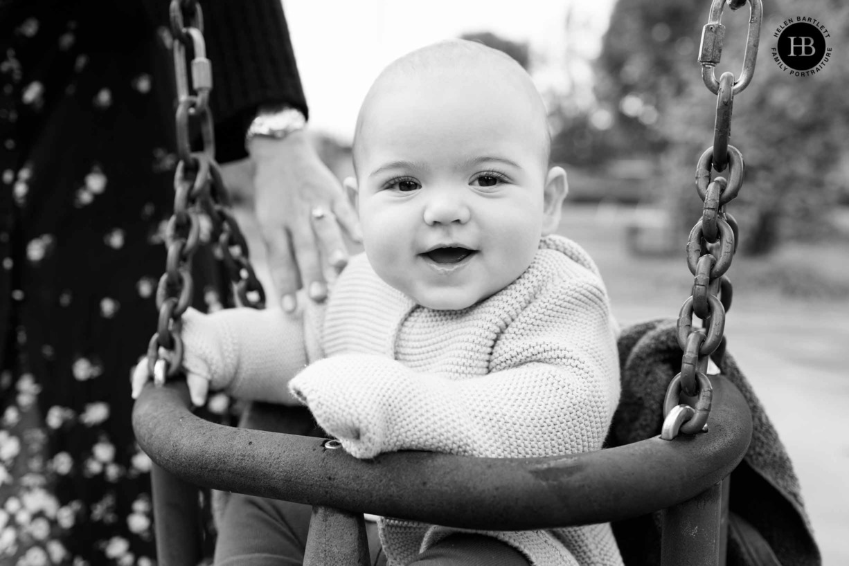 smiling-baby-on-swing