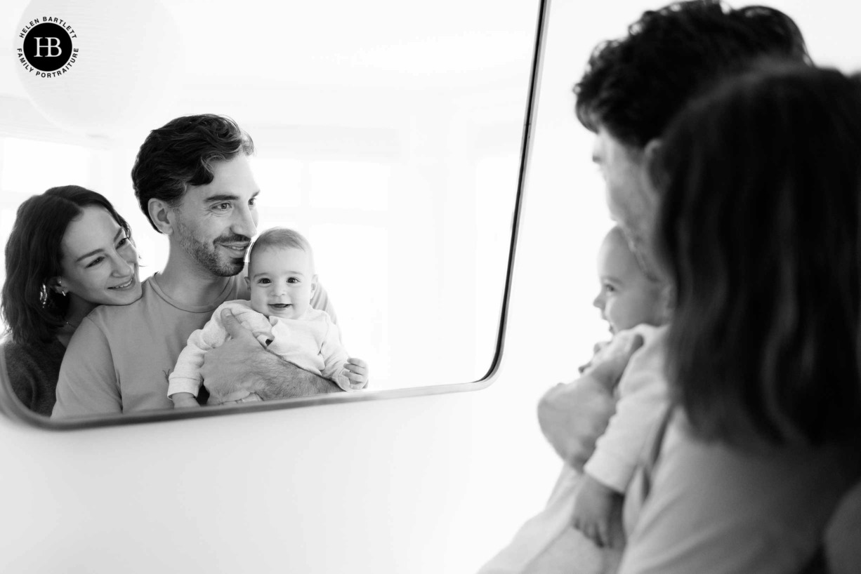 baby-looks-in-mirror