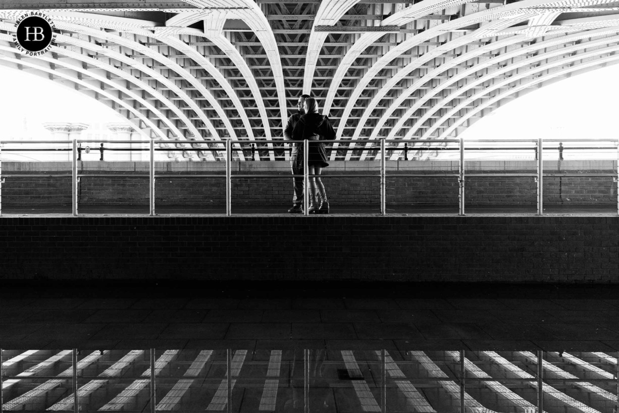 couple-under-blackfriars-bridge-with-reflections