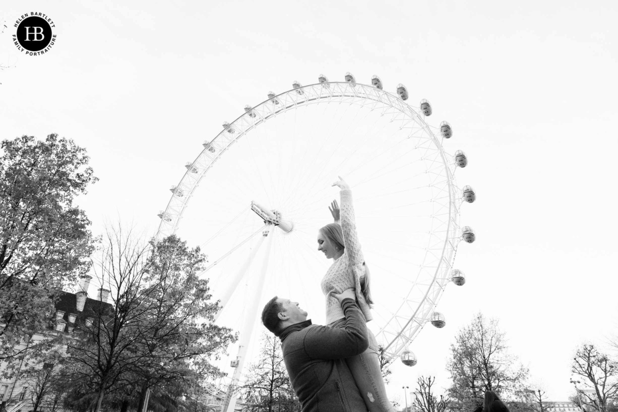 man-lifts-wife-by-london-eye