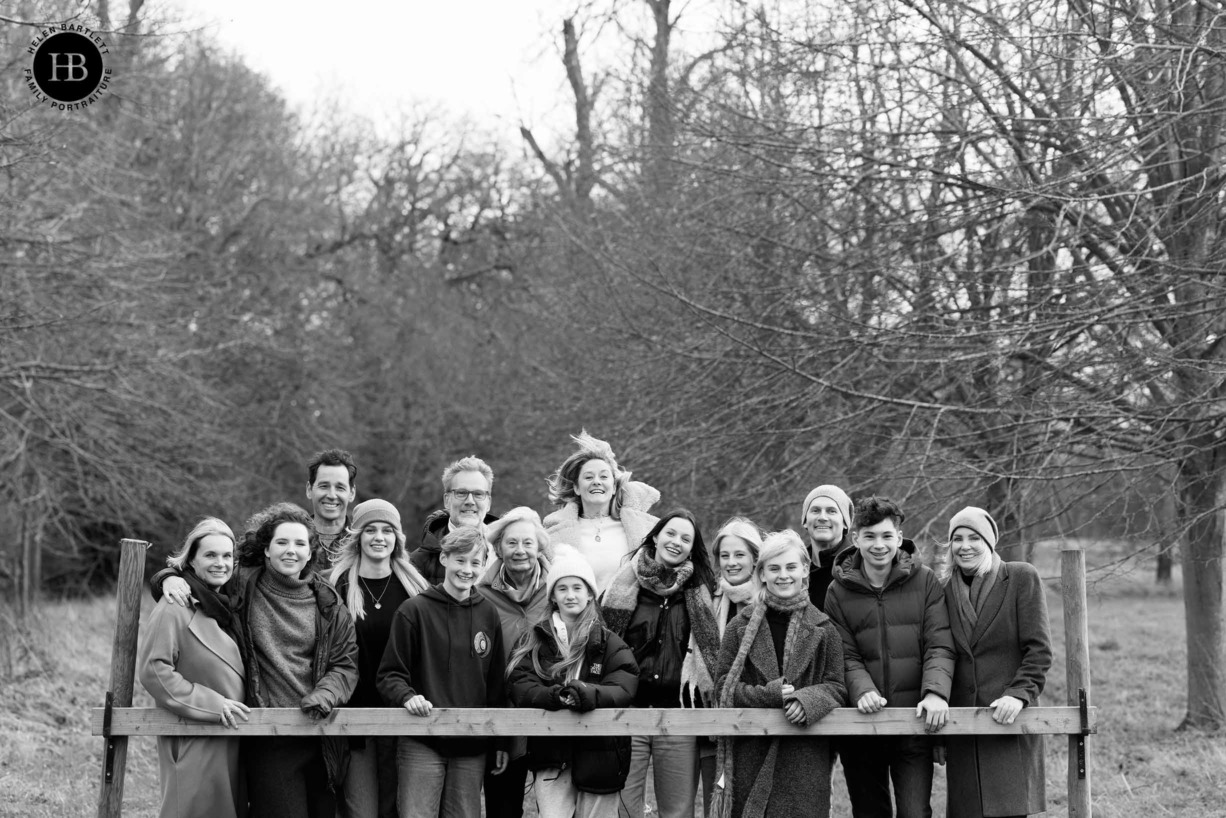 large-family-group-photo-leaning-on-gate