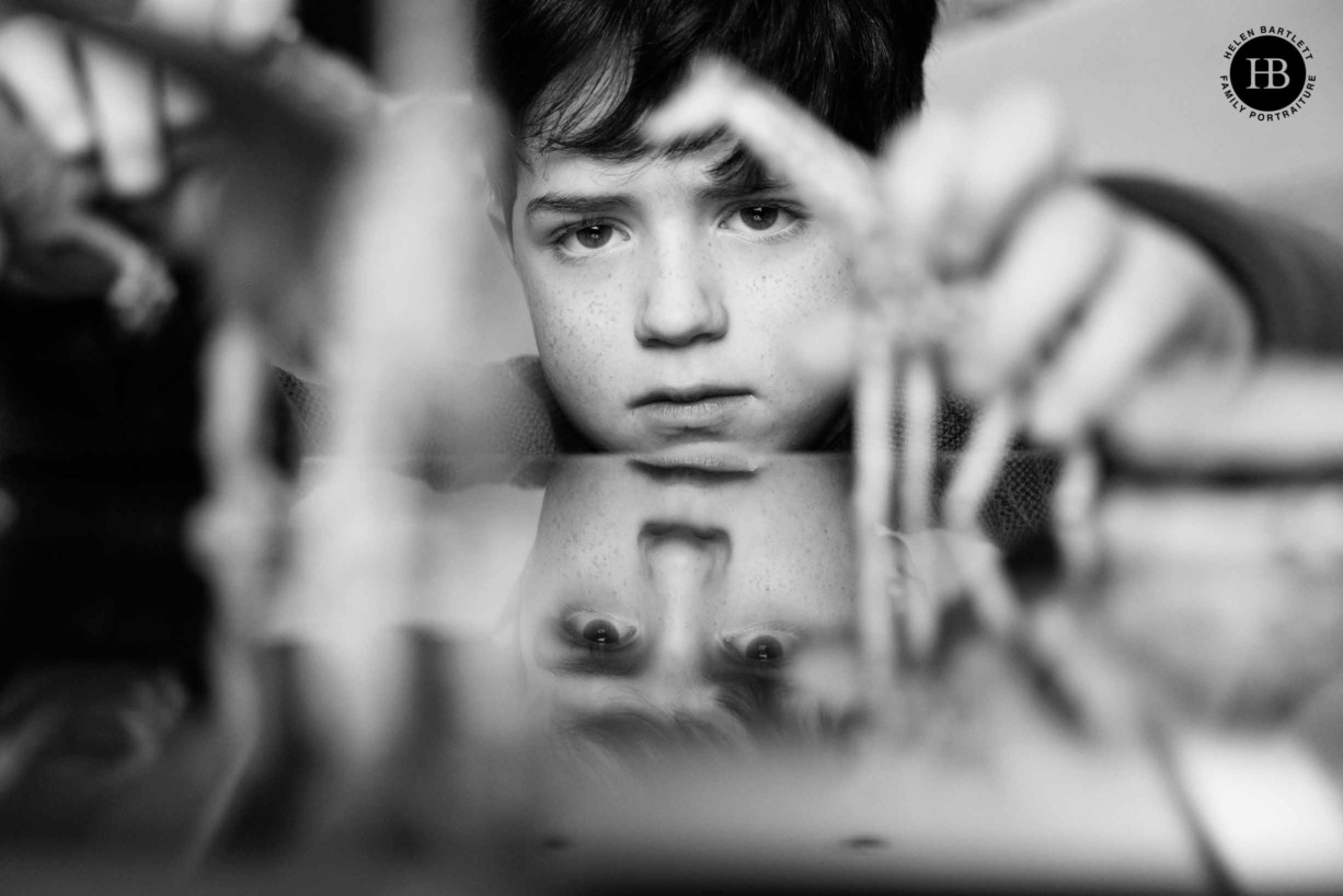 reflection-photograph-young-boy-with-dinosaurs