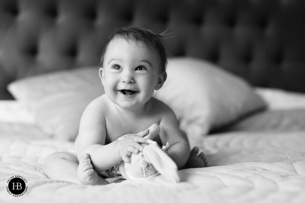 baby-portrait-on-parents-bed